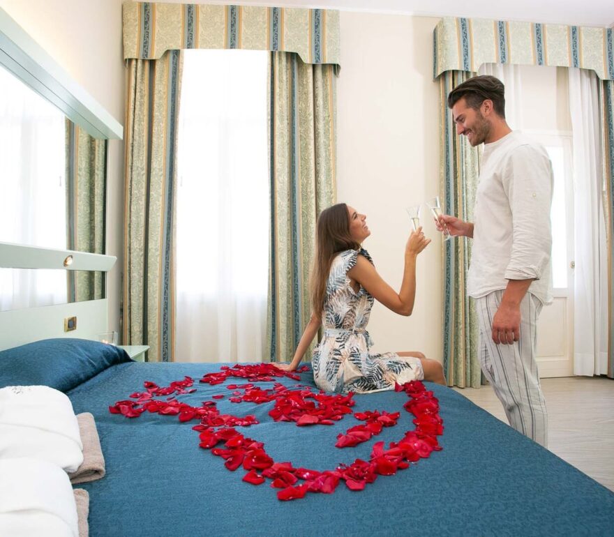 A Room with Rose Petals and a Toast