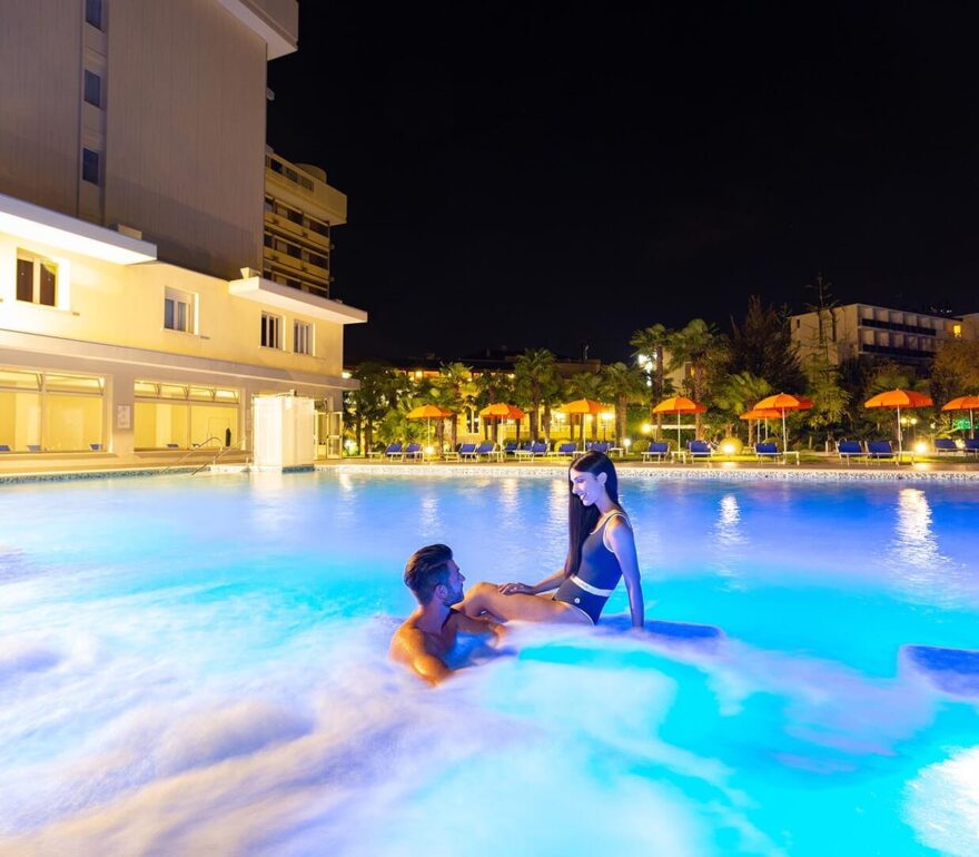 Nighttime thermal pool, relaxing atmosphere.