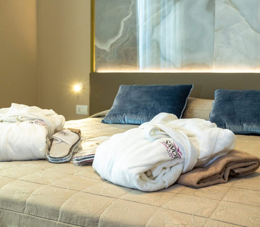 Room with bathrobes and spa amenities.